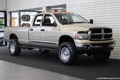 2005 Dodge Ram 3500 SLT 4dr Quad Cab  1-OWNER 100% RUST & CORROSION FREE* 5.9L HIGH OUTPUT CUMMINS* NEVER HAD 5TH WHEEL OR GOOSENECK* NEW 3 "BILSTEIN 5100 LEVEL LIFT W/NEW 35 " BFG KO3 10-PLYs* LEATHER LONG BED - Photo 2 - Portland, OR 97230