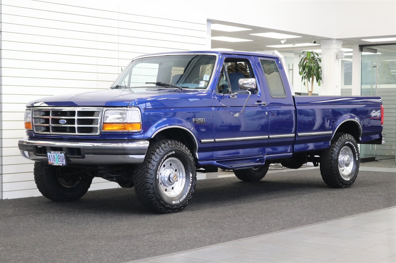 1997 Ford F-250 XLT  100% RUST FREE* 35K ACTUAL MILES& BIG BLOCK 460* NEW 33 " BFG KO3 10-PLY's* ALCOA'S* WARN HUBS* PROTECH HEADACHE RACK* LINEX BED LINER* TRAILER BRAKES* RUNNING BOARDS* COOLANT/AC /BRAKE FLUID FLUSH - Photo 1 - Portland, OR 97230
