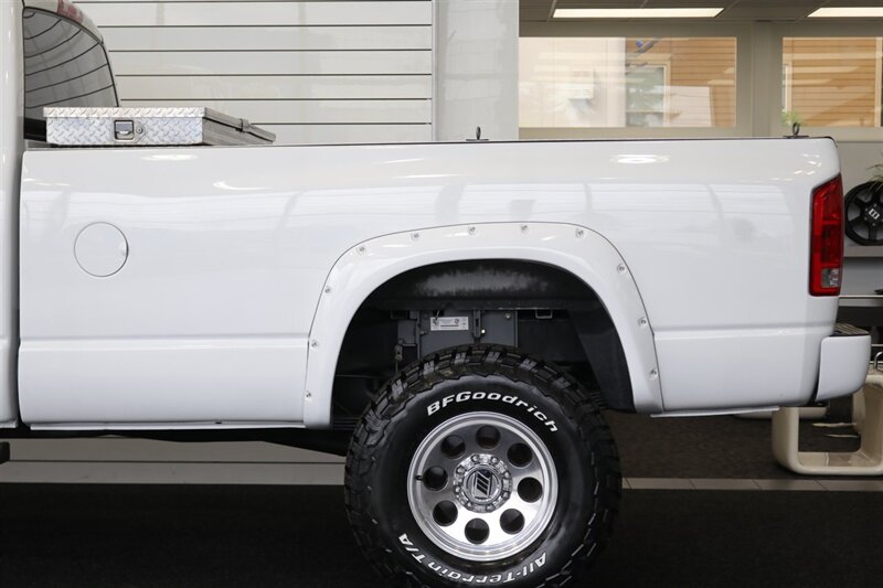 2003 Dodge Ram 2500 SLT 4dr Quad Cab SLT  1-OWNER* 6-SPEED MANUAL NV5600* 5.9L HO* 100% RUST FREE* NEW 3 "LEVEL KIT W/ NEW 35 " BFG KO3 12-PLY* NEW 17 "PRO COMPS* FULLY SERVICED* LIKE NEW IN & OUT* FULL PAINT MATCH BUMPERS-GRILLE - Photo 56 - Portland, OR 97230