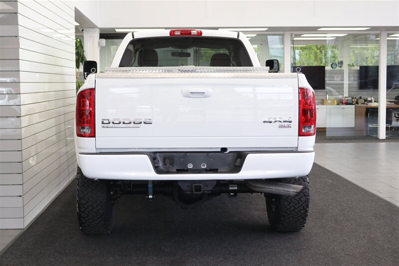 2003 Dodge Ram 2500 SLT 4dr Quad Cab SLT  1-OWNER* 6-SPEED MANUAL NV5600* 5.9L HO* 100% RUST FREE* NEW 3 "LEVEL KIT W/ NEW 35 " BFG KO3 12-PLY* NEW 17 "PRO COMPS* FULLY SERVICED* LIKE NEW IN & OUT* FULL PAINT MATCH BUMPERS-GRILLE - Photo 9 - Portland, OR 97230