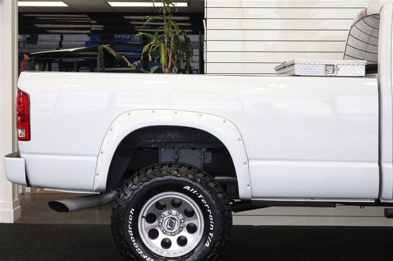 2003 Dodge Ram 2500 SLT 4dr Quad Cab SLT  1-OWNER* 6-SPEED MANUAL NV5600* 5.9L HO* 100% RUST FREE* NEW 3 "LEVEL KIT W/ NEW 35 " BFG KO3 12-PLY* NEW 17 "PRO COMPS* FULLY SERVICED* LIKE NEW IN & OUT* FULL PAINT MATCH BUMPERS-GRILLE - Photo 57 - Portland, OR 97230