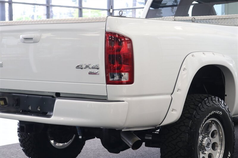 2003 Dodge Ram 2500 SLT 4dr Quad Cab SLT  1-OWNER* 6-SPEED MANUAL NV5600* 5.9L HO* 100% RUST FREE* NEW 3 "LEVEL KIT W/ NEW 35 " BFG KO3 12-PLY* NEW 17 "PRO COMPS* FULLY SERVICED* LIKE NEW IN & OUT* FULL PAINT MATCH BUMPERS-GRILLE - Photo 40 - Portland, OR 97230