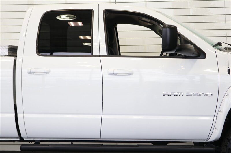 2003 Dodge Ram 2500 SLT 4dr Quad Cab SLT  1-OWNER* 6-SPEED MANUAL NV5600* 5.9L HO* 100% RUST FREE* NEW 3 "LEVEL KIT W/ NEW 35 " BFG KO3 12-PLY* NEW 17 "PRO COMPS* FULLY SERVICED* LIKE NEW IN & OUT* FULL PAINT MATCH BUMPERS-GRILLE - Photo 55 - Portland, OR 97230