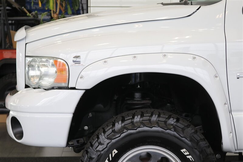 2003 Dodge Ram 2500 SLT 4dr Quad Cab SLT  1-OWNER* 6-SPEED MANUAL NV5600* 5.9L HO* 100% RUST FREE* NEW 3 "LEVEL KIT W/ NEW 35 " BFG KO3 12-PLY* NEW 17 "PRO COMPS* FULLY SERVICED* LIKE NEW IN & OUT* FULL PAINT MATCH BUMPERS-GRILLE - Photo 52 - Portland, OR 97230