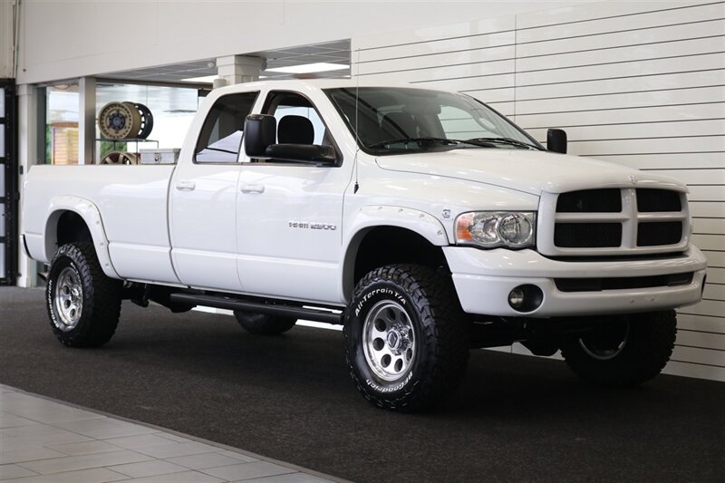 2003 Dodge Ram 2500 SLT 4dr Quad Cab SLT  1-OWNER* 6-SPEED MANUAL NV5600* 5.9L HO* 100% RUST FREE* NEW 3 "LEVEL KIT W/ NEW 35 " BFG KO3 12-PLY* NEW 17 "PRO COMPS* FULLY SERVICED* LIKE NEW IN & OUT* FULL PAINT MATCH BUMPERS-GRILLE - Photo 2 - Portland, OR 97230