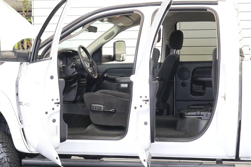 2003 Dodge Ram 2500 SLT 4dr Quad Cab SLT  1-OWNER* 6-SPEED MANUAL NV5600* 5.9L HO* 100% RUST FREE* NEW 3 "LEVEL KIT W/ NEW 35 " BFG KO3 12-PLY* NEW 17 "PRO COMPS* FULLY SERVICED* LIKE NEW IN & OUT* FULL PAINT MATCH BUMPERS-GRILLE - Photo 62 - Portland, OR 97230