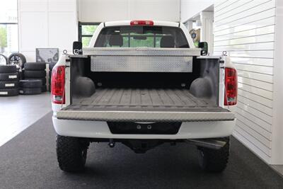 2003 Dodge Ram 2500 SLT 4dr Quad Cab SLT  1-OWNER* 6-SPEED MANUAL NV5600* 5.9L HO* 100% RUST FREE* NEW 3 "LEVEL KIT W/ NEW 35 " BFG KO3 12-PLY* NEW 17 "PRO COMPS* FULLY SERVICED* LIKE NEW IN & OUT* FULL PAINT MATCH BUMPERS-GRILLE - Photo 15 - Portland, OR 97230