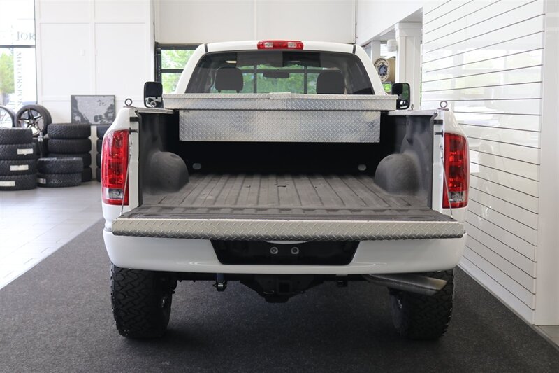 2003 Dodge Ram 2500 SLT 4dr Quad Cab SLT  1-OWNER* 6-SPEED MANUAL NV5600* 5.9L HO* 100% RUST FREE* NEW 3 "LEVEL KIT W/ NEW 35 " BFG KO3 12-PLY* NEW 17 "PRO COMPS* FULLY SERVICED* LIKE NEW IN & OUT* FULL PAINT MATCH BUMPERS-GRILLE - Photo 15 - Portland, OR 97230