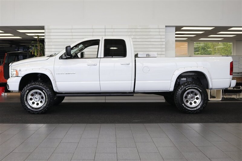 2003 Dodge Ram 2500 SLT 4dr Quad Cab SLT  1-OWNER* 6-SPEED MANUAL NV5600* 5.9L HO* 100% RUST FREE* NEW 3 "LEVEL KIT W/ NEW 35 " BFG KO3 12-PLY* NEW 17 "PRO COMPS* FULLY SERVICED* LIKE NEW IN & OUT* FULL PAINT MATCH BUMPERS-GRILLE - Photo 4 - Portland, OR 97230