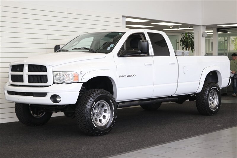 2003 Dodge Ram 2500 SLT 4dr Quad Cab SLT  1-OWNER* 6-SPEED MANUAL NV5600* 5.9L HO* 100% RUST FREE* NEW 3 "LEVEL KIT W/ NEW 35 " BFG KO3 12-PLY* NEW 17 "PRO COMPS* FULLY SERVICED* LIKE NEW IN & OUT* FULL PAINT MATCH BUMPERS-GRILLE - Photo 3 - Portland, OR 97230