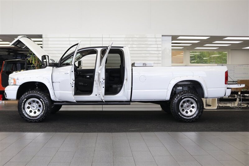 2003 Dodge Ram 2500 SLT 4dr Quad Cab SLT  1-OWNER* 6-SPEED MANUAL NV5600* 5.9L HO* 100% RUST FREE* NEW 3 "LEVEL KIT W/ NEW 35 " BFG KO3 12-PLY* NEW 17 "PRO COMPS* FULLY SERVICED* LIKE NEW IN & OUT* FULL PAINT MATCH BUMPERS-GRILLE - Photo 10 - Portland, OR 97230
