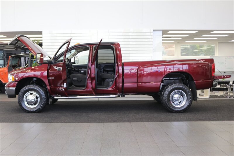 2003 Dodge Ram 3500 1-OWNER* 100% RUST FREE* 5.9L HO W/ 6-SPEED MANUAL* REAR AIR BAGS* NEW 33 " NITTO A/T 10-PLYS* FULL FRESH SERVICE* LINEX BED LINER* BOOKS-WINDOW STICKER-3 KEYS* - Photo 10 - Portland, OR 97230