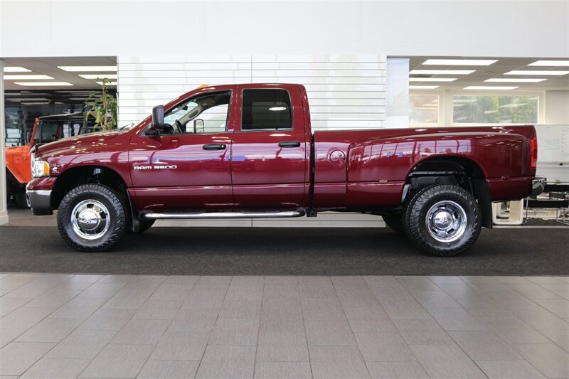 2003 Dodge Ram 3500 1-OWNER* 100% RUST FREE* 5.9L HO W/ 6-SPEED MANUAL* REAR AIR BAGS* NEW 33 " NITTO A/T 10-PLYS* FULL FRESH SERVICE* LINEX BED LINER* BOOKS-WINDOW STICKER-3 KEYS* - Photo 4 - Portland, OR 97230