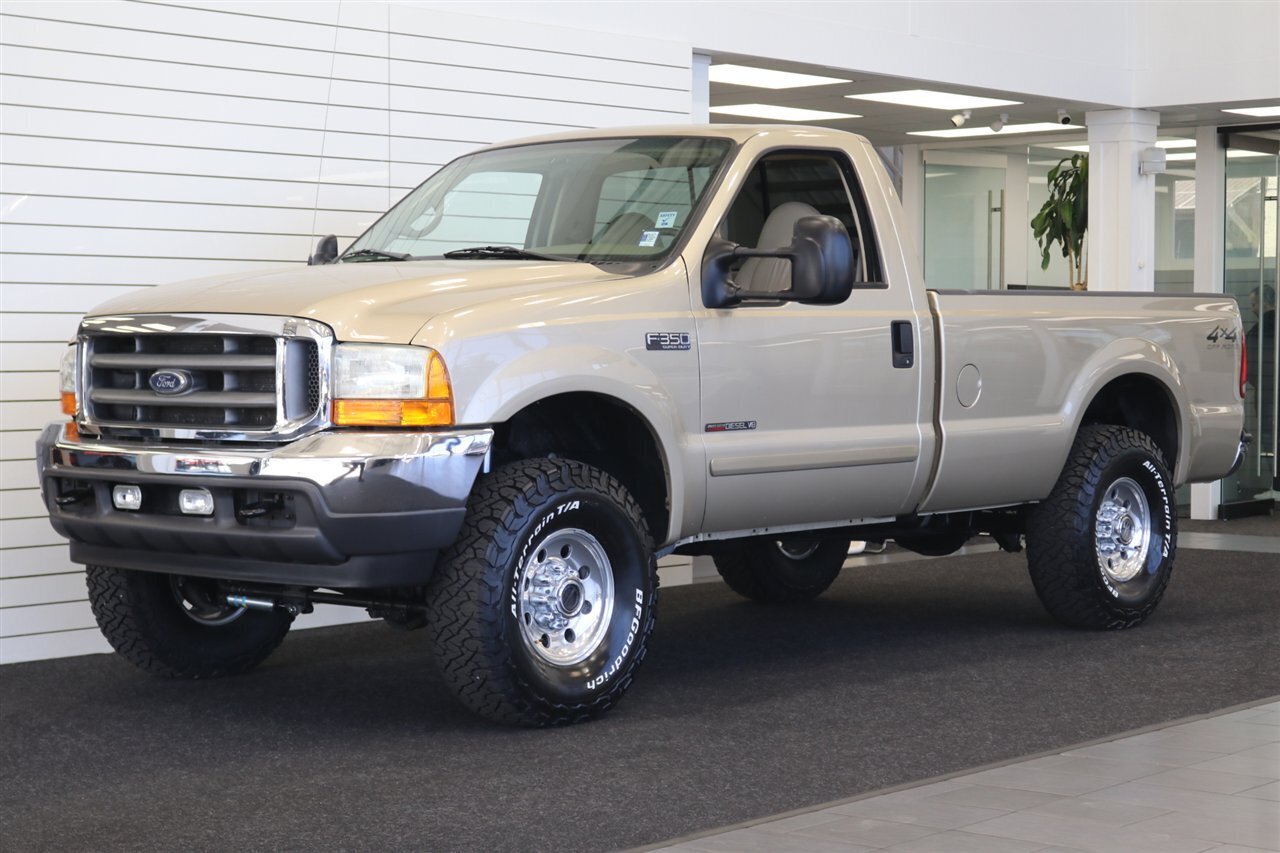 2001 Ford F-350 Lariat  6-SPEED* 1-CALIFORNIA OWNER* 100% RUST FREE* NEW 2.5 " LEVEL W/BILSTEIN 5100 SHOCKS* NEW 35 " BFG KO3s* FACTORY PTO* POWER INVERTER* LEATHER* ALL BOOKS-KEYS-WINDOW STICKER* COLLECTOR GRADE - Photo 1 - Portland, OR 97230
