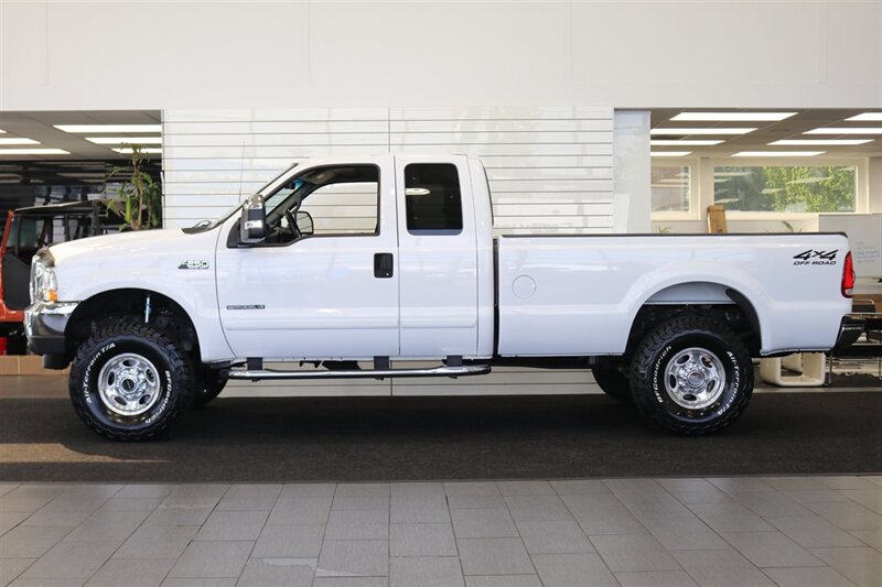 2002 Ford F-250 XLT  100% RUST FREE* 100% ACCIDENT FREE* LONG BED EXTRA CAB* LINEX BED LINER* NEW 2.5 "LEVEL KIT W/ BILSTEIN 5100 SHOCKS& STEERING STABILIZER* NEW 35 " BFG KO3 10-PLYs* UPGRADED GRILL & MIRRORS*FULL SERVICED - Photo 4 - Portland, OR 97230