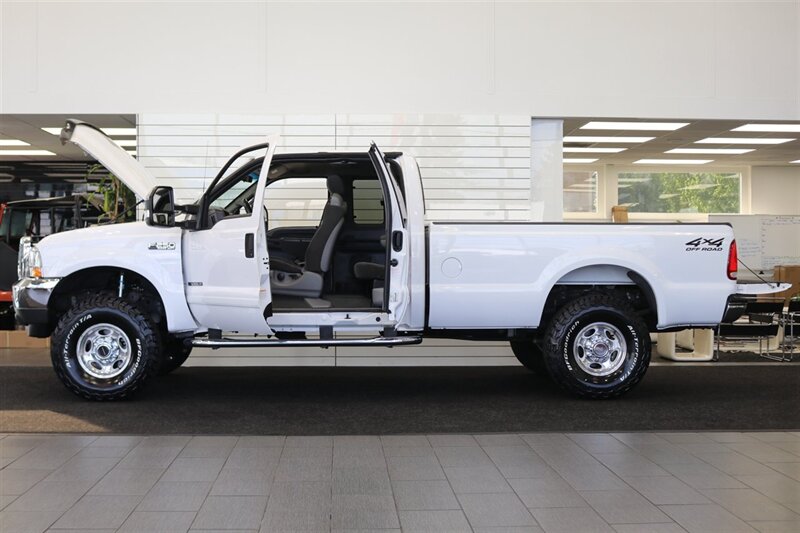 2002 Ford F-250 XLT  100% RUST FREE* 100% ACCIDENT FREE* LONG BED EXTRA CAB* LINEX BED LINER* NEW 2.5 "LEVEL KIT W/ BILSTEIN 5100 SHOCKS& STEERING STABILIZER* NEW 35 " BFG KO3 10-PLYs* UPGRADED GRILL & MIRRORS*FULL SERVICED - Photo 10 - Portland, OR 97230