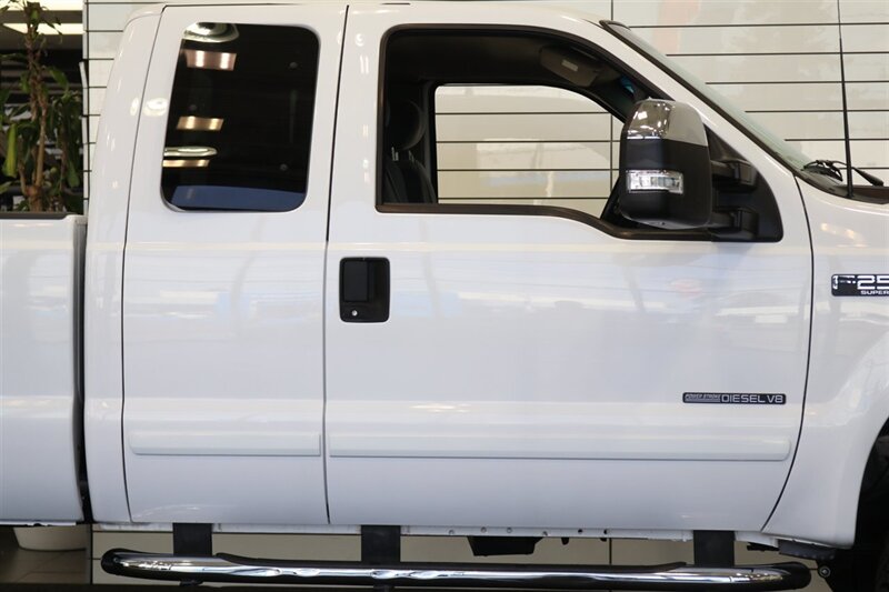 2002 Ford F-250 XLT  100% RUST FREE* 100% ACCIDENT FREE* LONG BED EXTRA CAB* LINEX BED LINER* NEW 2.5 "LEVEL KIT W/ BILSTEIN 5100 SHOCKS& STEERING STABILIZER* NEW 35 " BFG KO3 10-PLYs* UPGRADED GRILL & MIRRORS*FULL SERVICED - Photo 59 - Portland, OR 97230