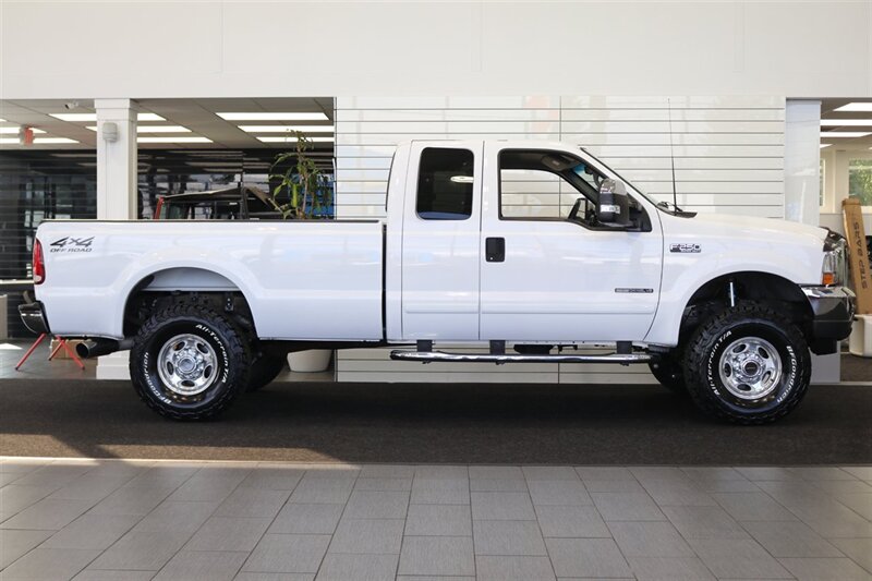 2002 Ford F-250 XLT  100% RUST FREE* 100% ACCIDENT FREE* LONG BED EXTRA CAB* LINEX BED LINER* NEW 2.5 "LEVEL KIT W/ BILSTEIN 5100 SHOCKS& STEERING STABILIZER* NEW 35 " BFG KO3 10-PLYs* UPGRADED GRILL & MIRRORS*FULL SERVICED - Photo 5 - Portland, OR 97230