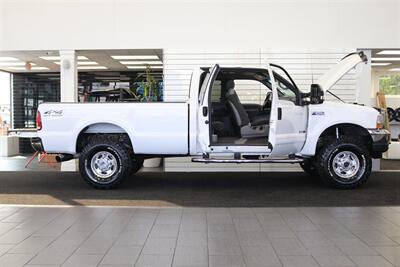 2002 Ford F-250 XLT  100% RUST FREE* 100% ACCIDENT FREE* LONG BED EXTRA CAB* LINEX BED LINER* NEW 2.5 "LEVEL KIT W/ BILSTEIN 5100 SHOCKS& STEERING STABILIZER* NEW 35 " BFG KO3 10-PLYs* UPGRADED GRILL & MIRRORS*FULL SERVICED - Photo 11 - Portland, OR 97230