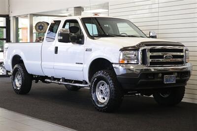 2002 Ford F-250 XLT  100% RUST FREE* 100% ACCIDENT FREE* LONG BED EXTRA CAB* LINEX BED LINER* NEW 2.5 "LEVEL KIT W/ BILSTEIN 5100 SHOCKS& STEERING STABILIZER* NEW 35 " BFG KO3 10-PLYs* UPGRADED GRILL & MIRRORS*FULL SERVICED - Photo 2 - Portland, OR 97230