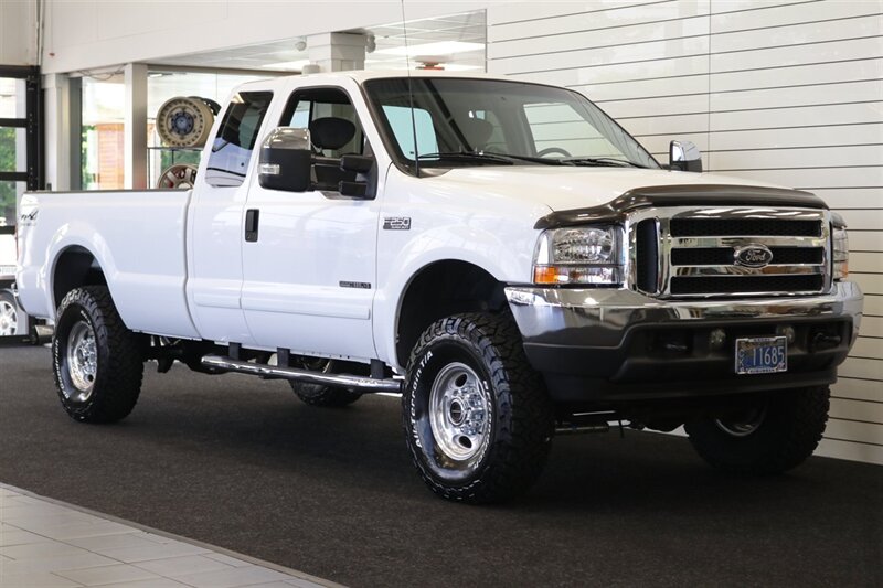 2002 Ford F-250 XLT  100% RUST FREE* 100% ACCIDENT FREE* LONG BED EXTRA CAB* LINEX BED LINER* NEW 2.5 "LEVEL KIT W/ BILSTEIN 5100 SHOCKS& STEERING STABILIZER* NEW 35 " BFG KO3 10-PLYs* UPGRADED GRILL & MIRRORS*FULL SERVICED - Photo 2 - Portland, OR 97230