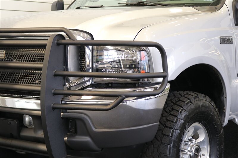 2001 Ford F-350 XLT  1-OWNER* 100% RUST FREE* NEW 2.5 " BILSTEIN LEVEL KIT* NEW 35 " TOYO'S 10-PLYS* FULL SERVICE W/ NEW FLUIDS-FILTERS-AC SERVICE-DOOR LOCKS* ALL ORIGINAL BOOKS-WINDOW STICKER-SERVICE RECORDS - Photo 10 - Portland, OR 97230