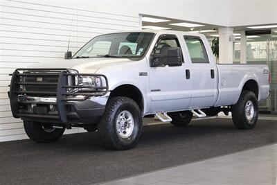 2001 Ford F-350 XLT  1-OWNER* 100% RUST FREE* NEW 2.5 " BILSTEIN LEVEL KIT* NEW 35 " TOYO'S 10-PLYS* FULL SERVICE W/ NEW FLUIDS-FILTERS-AC SERVICE-DOOR LOCKS* ALL ORIGINAL BOOKS-WINDOW STICKER-SERVICE RECORDS - Photo 1 - Portland, OR 97230