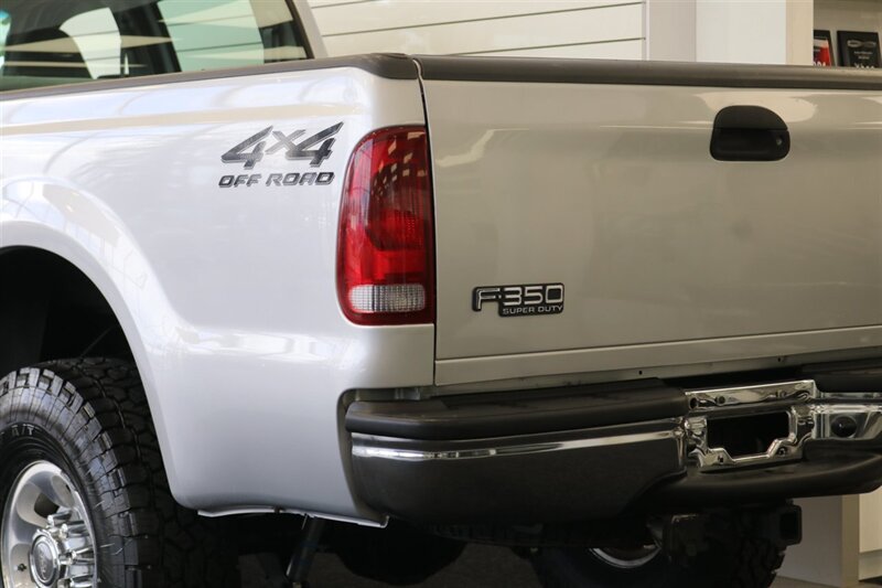 2001 Ford F-350 XLT  1-OWNER* 100% RUST FREE* NEW 2.5 " BILSTEIN LEVEL KIT* NEW 35 " TOYO'S 10-PLYS* FULL SERVICE W/ NEW FLUIDS-FILTERS-AC SERVICE-DOOR LOCKS* ALL ORIGINAL BOOKS-WINDOW STICKER-SERVICE RECORDS - Photo 13 - Portland, OR 97230