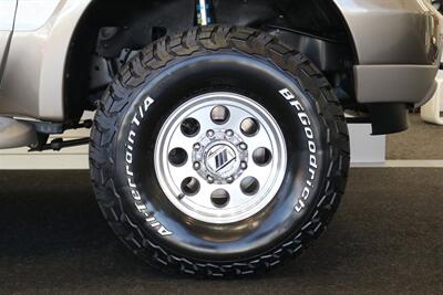 2004 Ford Excursion Eddie Bauer 1-OWNER* 100% RUST FREE* NEW 3 " FABTEC LEVEL LIFT W/ BILSTEIN 5100 SERIES SHOCKS* NEW 35 " BFG KO3* NEW 16 " PRO COMP WHEELS* UPDATED NEW SIDE MIRRORS* 05 FRONT GRILL PAINT MATCHED - Photo 34 - Portland, OR 97230