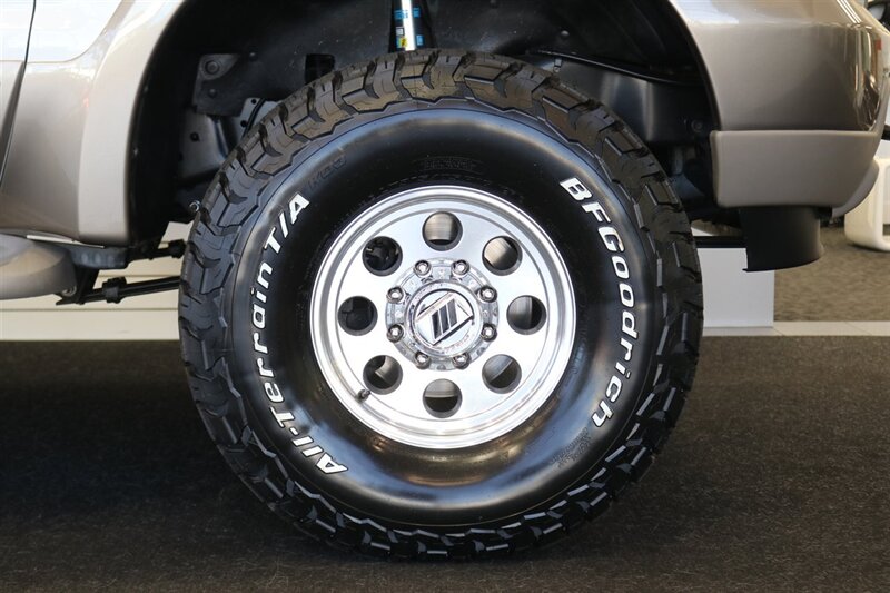 2004 Ford Excursion Eddie Bauer 1-OWNER* 100% RUST FREE* NEW 3 " FABTEC LEVEL LIFT W/ BILSTEIN 5100 SERIES SHOCKS* NEW 35 " BFG KO3* NEW 16 " PRO COMP WHEELS* UPDATED NEW SIDE MIRRORS* 05 FRONT GRILL PAINT MATCHED - Photo 34 - Portland, OR 97230