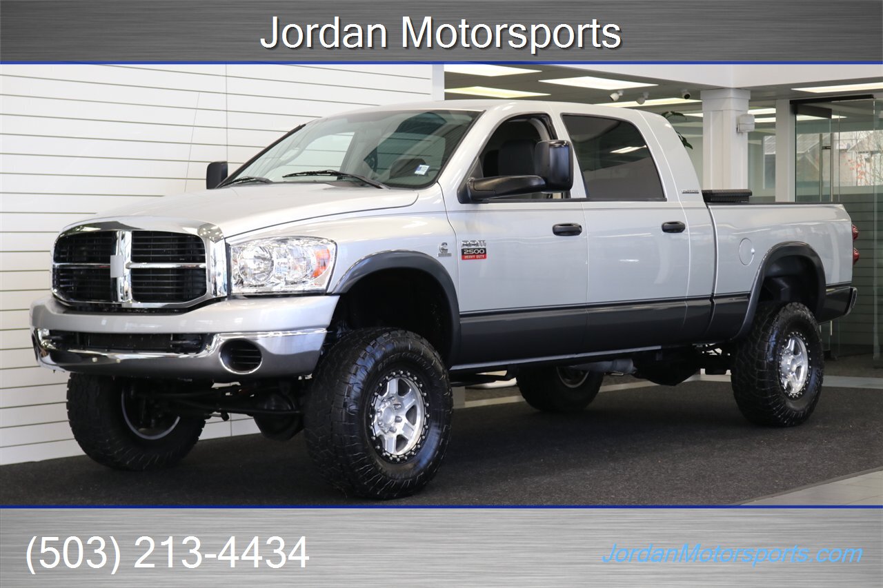 2007 Dodge Ram 2500 SLT 1-OWNER* 6-SPEED MANUAL CUMMINS 6.7L TUNED* 35 "TOYOS W/ 17 " INNOV8 WHEELS* NEW BRAKES-ROTORS-CALIPERS-AC RECHARGE-COOLANT FLUSH-BRAKE FLUID* HEATED LEATHER SEATS* 6-PASSENGER* - Photo 1 - Portland, OR 97230