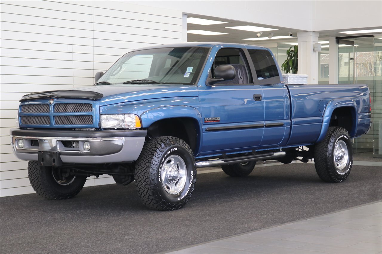 2002 Dodge Ram 2500 SLT Plus  83k MILES ONLY* 100% RUST FREE* NEW 33 " BFG KO3 10-PLYs* LINEX BED LINER* PAINT MATCHED FENDER FLARES* 0-ACCIDENTS* NEW BRAKES-ROTORS-CALIPERS-FLUIDS-FILTERS* ALL BOOKS & KEYS - Photo 1 - Portland, OR 97230