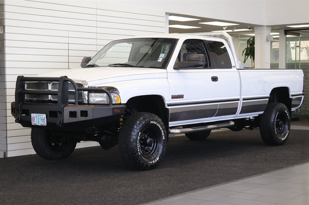 1997 Dodge Ram 2500 Laramie SLT  1-OREGON OWNER* 100% RUST FREE* PERFECT DASH* 5-SPEED MANUAL 5.9L CUMMINS* LINEX BED LINER* PACBRAKE* PROTECH HEADEACH RACK* 33 " COOPER 10-PLYs W/ NEW BLACK ROCK WHEELS* ALL BOOKS-MANUALS-KEY - Photo 1 - Portland, OR 97230