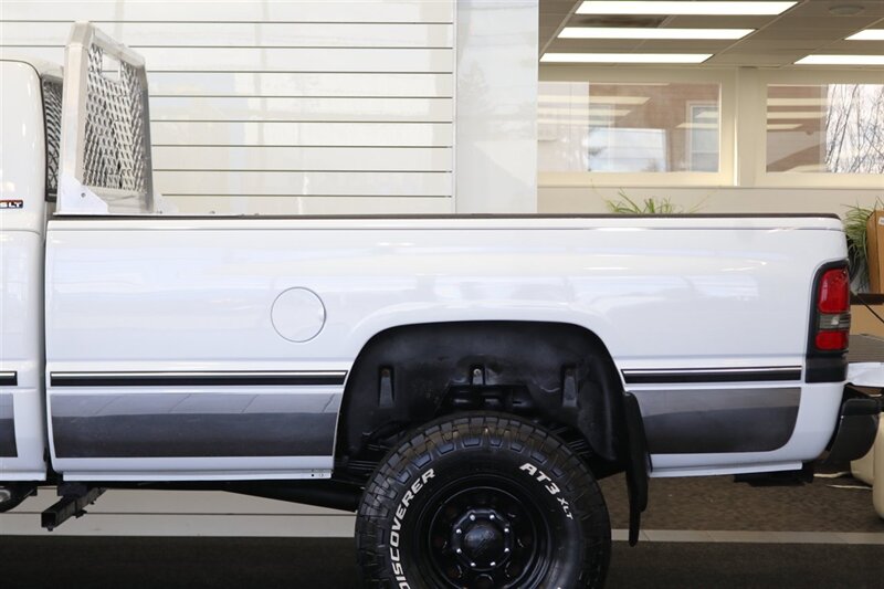 1997 Dodge Ram 2500 Laramie SLT  1-OREGON OWNER* 100% RUST FREE* PERFECT DASH* 5-SPEED MANUAL 5.9L CUMMINS* LINEX BED LINER* PACBRAKE* PROTECH HEADEACH RACK* 33 " COOPER 10-PLYs W/ NEW BLACK ROCK WHEELS* ALL BOOKS-MANUALS-KEY - Photo 64 - Portland, OR 97230