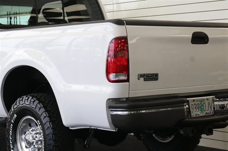 2002 Ford F-250 XLT  1-OWNER* 100% RUST FREE* ALL SERVICE RECORDS SINCE NEW* NEW 2.5 " LEVEL KIT W/ NEW BILSTEIN 5100 SHOCKS / NEW 33 " BFG KO3 10-PLYS* ALL BOOKS&KEYS&WINDOW STICKER* NEW FLUIDS-NEW AC COMPRESSOR - Photo 14 - Portland, OR 97230