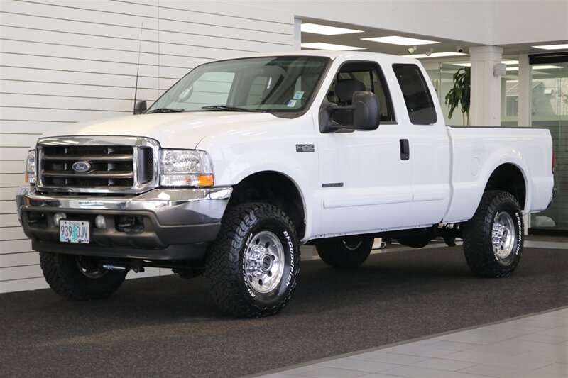 2002 Ford F-250 XLT  1-OWNER* 100% RUST FREE* ALL SERVICE RECORDS SINCE NEW* NEW 2.5 " LEVEL KIT W/ NEW BILSTEIN 5100 SHOCKS / NEW 33 " BFG KO3 10-PLYS* ALL BOOKS&KEYS&WINDOW STICKER* NEW FLUIDS-NEW AC COMPRESSOR - Photo 3 - Portland, OR 97230