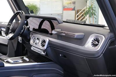 2025 Mercedes-Benz AMG G 63  1-OWNER* FULL PPF ON FRONT NOSE* MONZA GREY MAGNO-CARBON FIBER INTERIOR TRIM-22 " AMG WHEELS-EXCLUSIVE INTERIOR PLUS-AMG NIGHT PACKAGE MAGNOAMG PERFORMANCE STEERING WHEEL-BLACK MAGNO ROOF* - Photo 50 - Portland, OR 97230