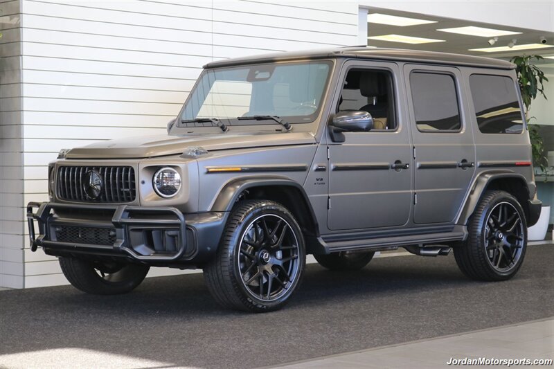 2025 Mercedes-Benz AMG G 63  1-OWNER* FULL PPF ON FRONT NOSE* MONZA GREY MAGNO-CARBON FIBER INTERIOR TRIM-22 " AMG WHEELS-EXCLUSIVE INTERIOR PLUS-AMG NIGHT PACKAGE MAGNOAMG PERFORMANCE STEERING WHEEL-BLACK MAGNO ROOF* - Photo 3 - Portland, OR 97230
