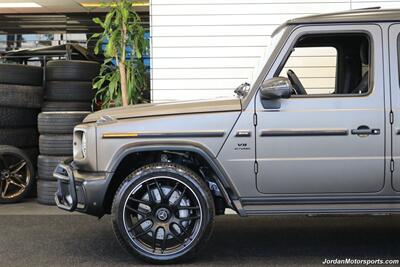 2025 Mercedes-Benz AMG G 63  1-OWNER* FULL PPF ON FRONT NOSE* MONZA GREY MAGNO-CARBON FIBER INTERIOR TRIM-22 " AMG WHEELS-EXCLUSIVE INTERIOR PLUS-AMG NIGHT PACKAGE MAGNOAMG PERFORMANCE STEERING WHEEL-BLACK MAGNO ROOF* - Photo 26 - Portland, OR 97230