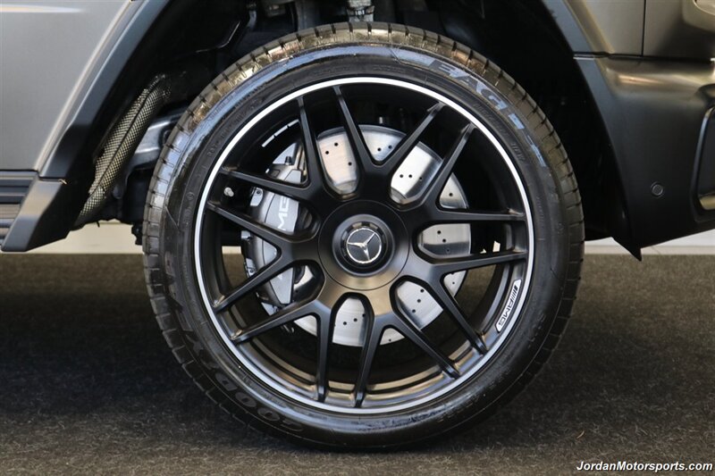 2025 Mercedes-Benz AMG G 63  1-OWNER* FULL PPF ON FRONT NOSE* MONZA GREY MAGNO-CARBON FIBER INTERIOR TRIM-22 " AMG WHEELS-EXCLUSIVE INTERIOR PLUS-AMG NIGHT PACKAGE MAGNOAMG PERFORMANCE STEERING WHEEL-BLACK MAGNO ROOF* - Photo 35 - Portland, OR 97230