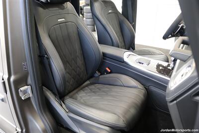 2025 Mercedes-Benz AMG G 63  1-OWNER* FULL PPF ON FRONT NOSE* MONZA GREY MAGNO-CARBON FIBER INTERIOR TRIM-22 " AMG WHEELS-EXCLUSIVE INTERIOR PLUS-AMG NIGHT PACKAGE MAGNOAMG PERFORMANCE STEERING WHEEL-BLACK MAGNO ROOF* - Photo 17 - Portland, OR 97230