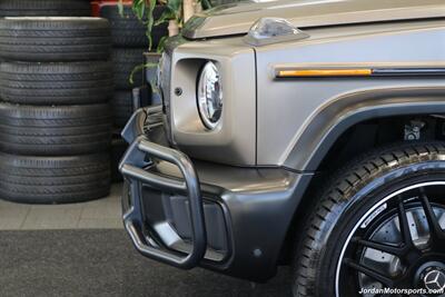 2025 Mercedes-Benz AMG G 63  1-OWNER* FULL PPF ON FRONT NOSE* MONZA GREY MAGNO-CARBON FIBER INTERIOR TRIM-22 " AMG WHEELS-EXCLUSIVE INTERIOR PLUS-AMG NIGHT PACKAGE MAGNOAMG PERFORMANCE STEERING WHEEL-BLACK MAGNO ROOF* - Photo 55 - Portland, OR 97230
