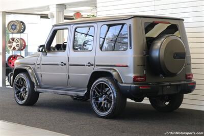 2025 Mercedes-Benz AMG G 63  1-OWNER* FULL PPF ON FRONT NOSE* MONZA GREY MAGNO-CARBON FIBER INTERIOR TRIM-22 " AMG WHEELS-EXCLUSIVE INTERIOR PLUS-AMG NIGHT PACKAGE MAGNOAMG PERFORMANCE STEERING WHEEL-BLACK MAGNO ROOF* - Photo 6 - Portland, OR 97230
