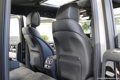2025 Mercedes-Benz AMG G 63  1-OWNER* FULL PPF ON FRONT NOSE* MONZA GREY MAGNO-CARBON FIBER INTERIOR TRIM-22 " AMG WHEELS-EXCLUSIVE INTERIOR PLUS-AMG NIGHT PACKAGE MAGNOAMG PERFORMANCE STEERING WHEEL-BLACK MAGNO ROOF* - Photo 49 - Portland, OR 97230