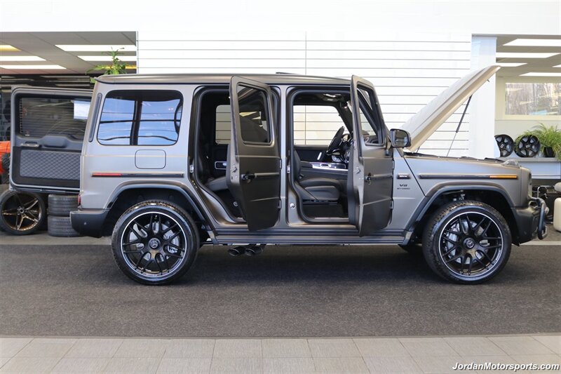 2025 Mercedes-Benz AMG G 63  1-OWNER* FULL PPF ON FRONT NOSE* MONZA GREY MAGNO-CARBON FIBER INTERIOR TRIM-22 " AMG WHEELS-EXCLUSIVE INTERIOR PLUS-AMG NIGHT PACKAGE MAGNOAMG PERFORMANCE STEERING WHEEL-BLACK MAGNO ROOF* - Photo 53 - Portland, OR 97230