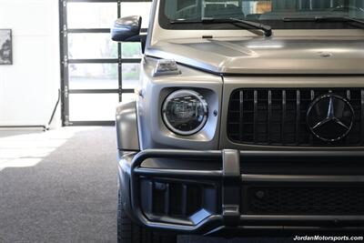 2025 Mercedes-Benz AMG G 63  1-OWNER* FULL PPF ON FRONT NOSE* MONZA GREY MAGNO-CARBON FIBER INTERIOR TRIM-22 " AMG WHEELS-EXCLUSIVE INTERIOR PLUS-AMG NIGHT PACKAGE MAGNOAMG PERFORMANCE STEERING WHEEL-BLACK MAGNO ROOF* - Photo 13 - Portland, OR 97230