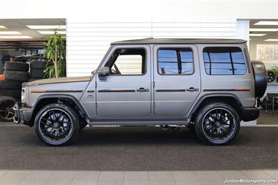 2025 Mercedes-Benz AMG G 63  1-OWNER* FULL PPF ON FRONT NOSE* MONZA GREY MAGNO-CARBON FIBER INTERIOR TRIM-22 " AMG WHEELS-EXCLUSIVE INTERIOR PLUS-AMG NIGHT PACKAGE MAGNOAMG PERFORMANCE STEERING WHEEL-BLACK MAGNO ROOF* - Photo 4 - Portland, OR 97230