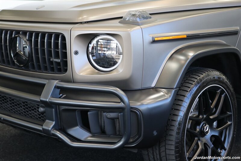 2025 Mercedes-Benz AMG G 63  1-OWNER* FULL PPF ON FRONT NOSE* MONZA GREY MAGNO-CARBON FIBER INTERIOR TRIM-22 " AMG WHEELS-EXCLUSIVE INTERIOR PLUS-AMG NIGHT PACKAGE MAGNOAMG PERFORMANCE STEERING WHEEL-BLACK MAGNO ROOF* - Photo 10 - Portland, OR 97230