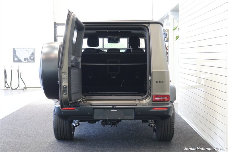 2025 Mercedes-Benz AMG G 63  1-OWNER* FULL PPF ON FRONT NOSE* MONZA GREY MAGNO-CARBON FIBER INTERIOR TRIM-22 " AMG WHEELS-EXCLUSIVE INTERIOR PLUS-AMG NIGHT PACKAGE MAGNOAMG PERFORMANCE STEERING WHEEL-BLACK MAGNO ROOF* - Photo 31 - Portland, OR 97230