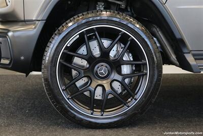 2025 Mercedes-Benz AMG G 63  1-OWNER* FULL PPF ON FRONT NOSE* MONZA GREY MAGNO-CARBON FIBER INTERIOR TRIM-22 " AMG WHEELS-EXCLUSIVE INTERIOR PLUS-AMG NIGHT PACKAGE MAGNOAMG PERFORMANCE STEERING WHEEL-BLACK MAGNO ROOF* - Photo 32 - Portland, OR 97230